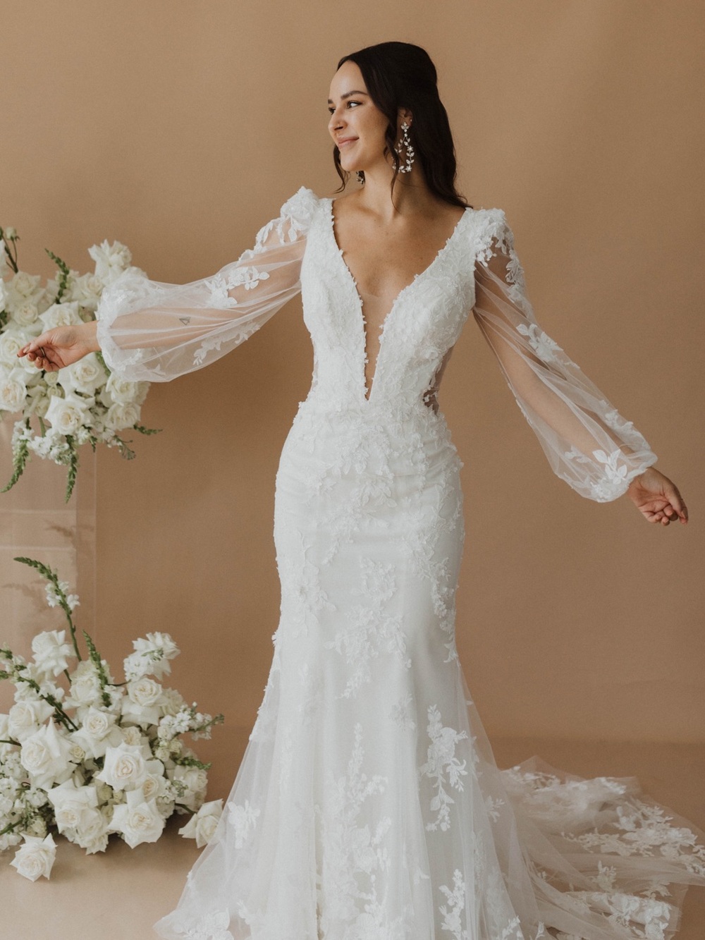 Ivory Lace Plunge V-Neck Bridal Gown with Sheer Bishop Sleeves